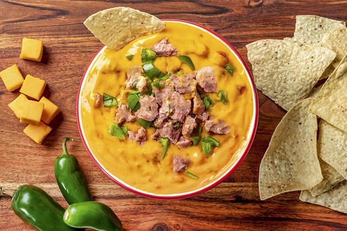 Hofmann Jalapeño Cheddar Sausage queso with chips